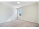 Bright bedroom with neutral carpet, a window letting in natural light at 1853 Summer Serenity Dr, Kissimmee, FL 34744