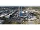 This aerial shows a large outdoor waterpark and amusement park with waterslides, rollercoasters, and entertainment for all ages at 2716 Bushman Dr, Kissimmee, FL 34746