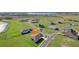 The aerial view highlights the property's location in a well-planned community with access to nearby lakes and green spaces at 267 Spinnaker Ct, Auburndale, FL 33823