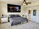 Bedroom showcasing a bed, nightstands, and an ensuite bathroom at 319 Celebration Blvd, Celebration, FL 34747