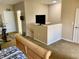 Bright second floor bedroom, featuring a balcony and workout equipment at 319 Celebration Blvd, Celebration, FL 34747