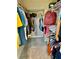 Walk-in closet provides ample storage space and organization for clothing at 319 Celebration Blvd, Celebration, FL 34747