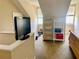 Upstairs loft area with built in shelves and comfortable space at 319 Celebration Blvd, Celebration, FL 34747