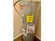 Close-up view of a Rheem water heater with Energy Guide label and other important information at 319 Celebration Blvd, Celebration, FL 34747