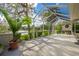 Spacious screened lanai with views of the water fountain at 62 Coquina Ridge Way, Ormond Beach, FL 32174