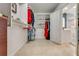 Large walk-in closet offering ample storage with custom shelving and organization at 62 Coquina Ridge Way, Ormond Beach, FL 32174
