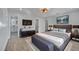 Spacious main bedroom with neutral color palette and a stylish en-suite bathroom at 715 Eastover Cir, Deland, FL 32724