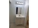 Bathroom with a vanity, mirror, and lighting at 7900 S Orange Blossom Trl # 1120, Orlando, FL 32809