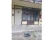 Exterior view of a commercial building with a large window and entrance at 7900 S Orange Blossom Trl # 1120, Orlando, FL 32809