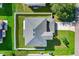 Top-down view of a house with a fenced yard at 1746 Pompano Dr, Poinciana, FL 34759
