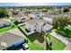 House with a large yard and driveway, neighborhood view at 1746 Pompano Dr, Poinciana, FL 34759