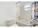 This well-lit bathroom features a shower and bathtub combination at 1746 Pompano Dr, Poinciana, FL 34759