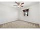 Neutral bedroom with carpeted floors and a ceiling fan at 1746 Pompano Dr, Poinciana, FL 34759