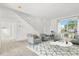 Bright living room with a geometric rug, comfortable seating, and lots of natural light at 1746 Pompano Dr, Poinciana, FL 34759