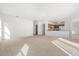 Spacious living area with open floor plan and kitchen view at 1746 Pompano Dr, Poinciana, FL 34759