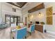 Community lobby with comfortable seating, beverage station, and modern decor at 9099 Hazard St, Davenport, FL 33896