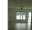 View of the living room showing the tile floor and fan at 106 Sparrow Ct, Kissimmee, FL 34759