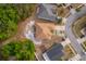 Birds eye view shows the property's location within a residential area near tree-lined streets and community at 2507 Monaco Cove Cir, Orlando, FL 32825