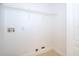 Bright laundry room with tiled floors, wire shelving and washer and dryer hookups at 2507 Monaco Cove Cir, Orlando, FL 32825