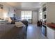 Cozy bedroom with two beds, desk, and convenient kitchenette setup at 5245 W Irlo Bronson Memorial Hwy # 244, Kissimmee, FL 34746