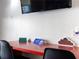 Red desk with decor and chairs at 5245 W Irlo Bronson Memorial Hwy # 244, Kissimmee, FL 34746