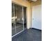 Balcony featuring sliding glass door leading into the light-filled living space at 544 Orange Dr # 10, Altamonte Springs, FL 32701