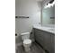 Bathroom featuring gray vanity, white countertop, and wood-look flooring at 544 Orange Dr # 10, Altamonte Springs, FL 32701