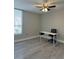 Bedroom featuring a desk and a ceiling fan at 544 Orange Dr # 10, Altamonte Springs, FL 32701