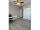 Bedroom featuring a ceiling fan, neutral walls, updated flooring, and a closet at 544 Orange Dr # 10, Altamonte Springs, FL 32701