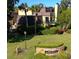 Bay Hill Condominiums exterior view showing tropical landscaping and well-maintained grounds at 6258 Masters Blvd # C204, Orlando, FL 32819