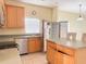 Functional kitchen featuring stainless steel appliances, ample counter space and a large island at 2109 Woodsedge Dr, Kissimmee, FL 34746