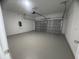 Two-car garage with epoxy flooring and automatic opener at 6809 149Th Lane Rd, Ocala, FL 34473