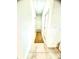 Bright hallway with tile flooring and neutral walls at 6809 149Th Lane Rd, Ocala, FL 34473