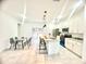 Modern kitchen with white cabinets, granite countertops, and island at 6809 149Th Lane Rd, Ocala, FL 34473