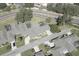 An aerial view shows the townhomes and the surrounding roads at 1493 Magellan Cir # 504, Orlando, FL 32818