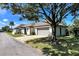 Charming single-story home featuring a two-car garage, well-maintained landscaping, and a welcoming entrance at 1493 Magellan Cir # 504, Orlando, FL 32818