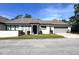 Charming single-story home with an attached garage and well-maintained landscaping in a neighborhood setting at 1493 Magellan Cir # 504, Orlando, FL 32818