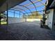 A covered patio with brick flooring, offering shade and comfort for outdoor living at 1493 Magellan Cir # 504, Orlando, FL 32818