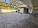 Spacious screened patio with brick pavers and access to the backyard area at 1493 Magellan Cir # 504, Orlando, FL 32818