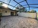 The enclosed patio has an overhead sun shade and access to the backyard at 1493 Magellan Cir # 504, Orlando, FL 32818