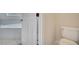 Bathroom features a soaking tub with neutral tiles, a toilet and a neutral walls at 2505 Dharma Cir, Kissimmee, FL 34746