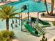 Community pool with interactive water features including slides, and a large pool for swimming at 2505 Dharma Cir, Kissimmee, FL 34746