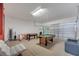 Spacious game room with pool table, foosball table, and seating area at 2505 Dharma Cir, Kissimmee, FL 34746