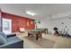Bright game room with a pool table, foosball table, and comfortable seating at 2505 Dharma Cir, Kissimmee, FL 34746