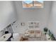 Bright living room features soaring ceilings, large windows, and contemporary furnishings at 2505 Dharma Cir, Kissimmee, FL 34746