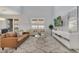 Bright living room features high ceilings, a large window, modern decor and a plush rug at 2505 Dharma Cir, Kissimmee, FL 34746
