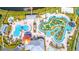 Aerial view of community amenities, including pools, a lazy river, and miniature golf at 2769 Bookmark Dr, Kissimmee, FL 34746