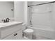 Bathroom features neutral walls, tile flooring, and a tub-shower combo at 3617 Scarlet Oak Dr, St Cloud, FL 34772
