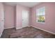 Bedroom features neutral walls, tile flooring, and a window at 3617 Scarlet Oak Dr, St Cloud, FL 34772