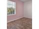 Bedroom featuring neutral walls, tile flooring, and a window at 3617 Scarlet Oak Dr, St Cloud, FL 34772